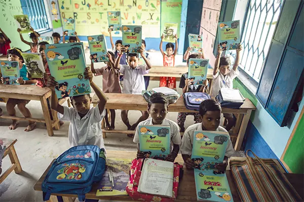 Children showing books